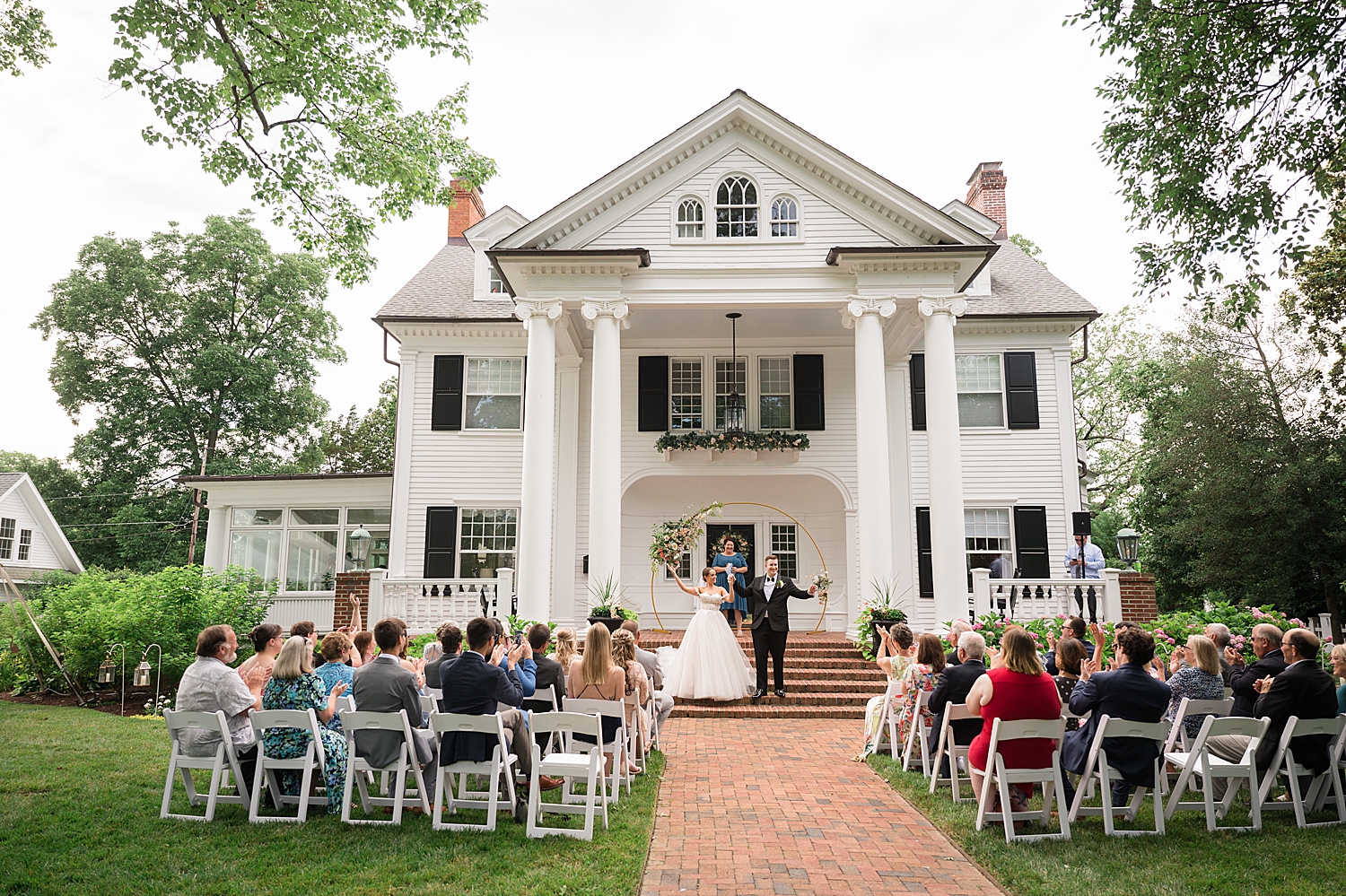 bride and groom celebrate during ceremony