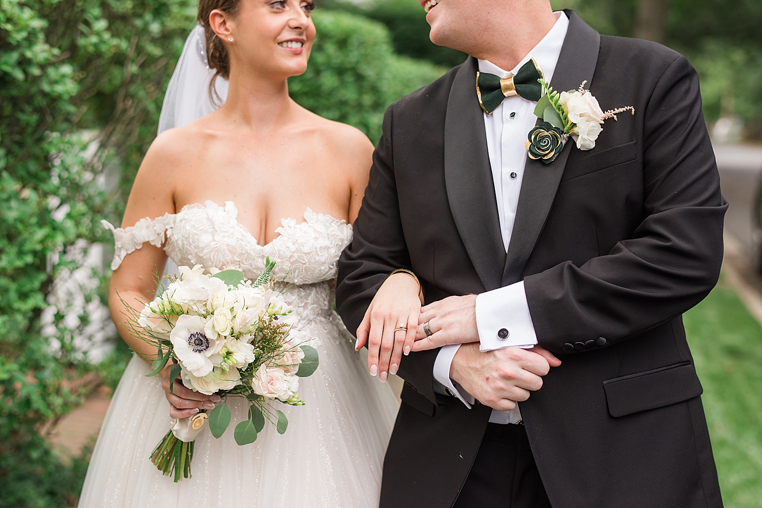 bride and groom portrait hold hands