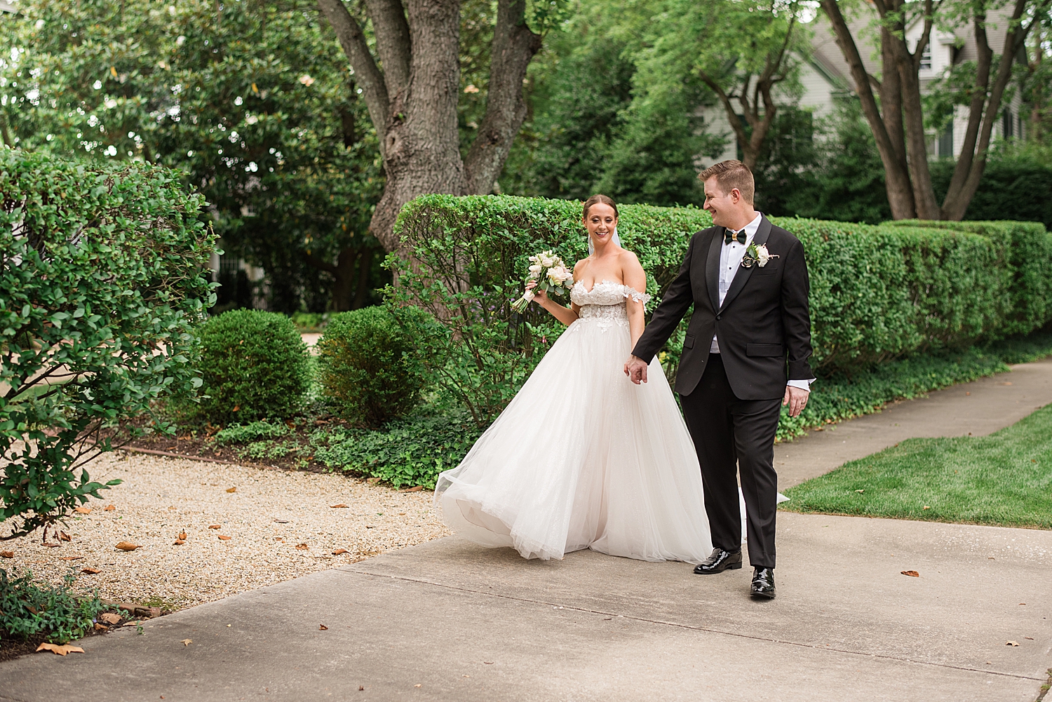 bride and groom portrait walking