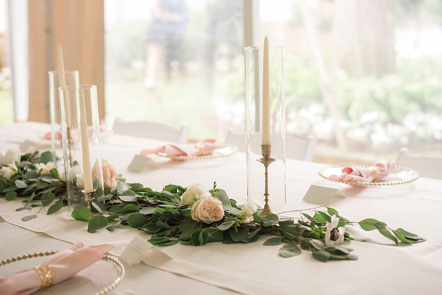 reception details, greenery, light pink