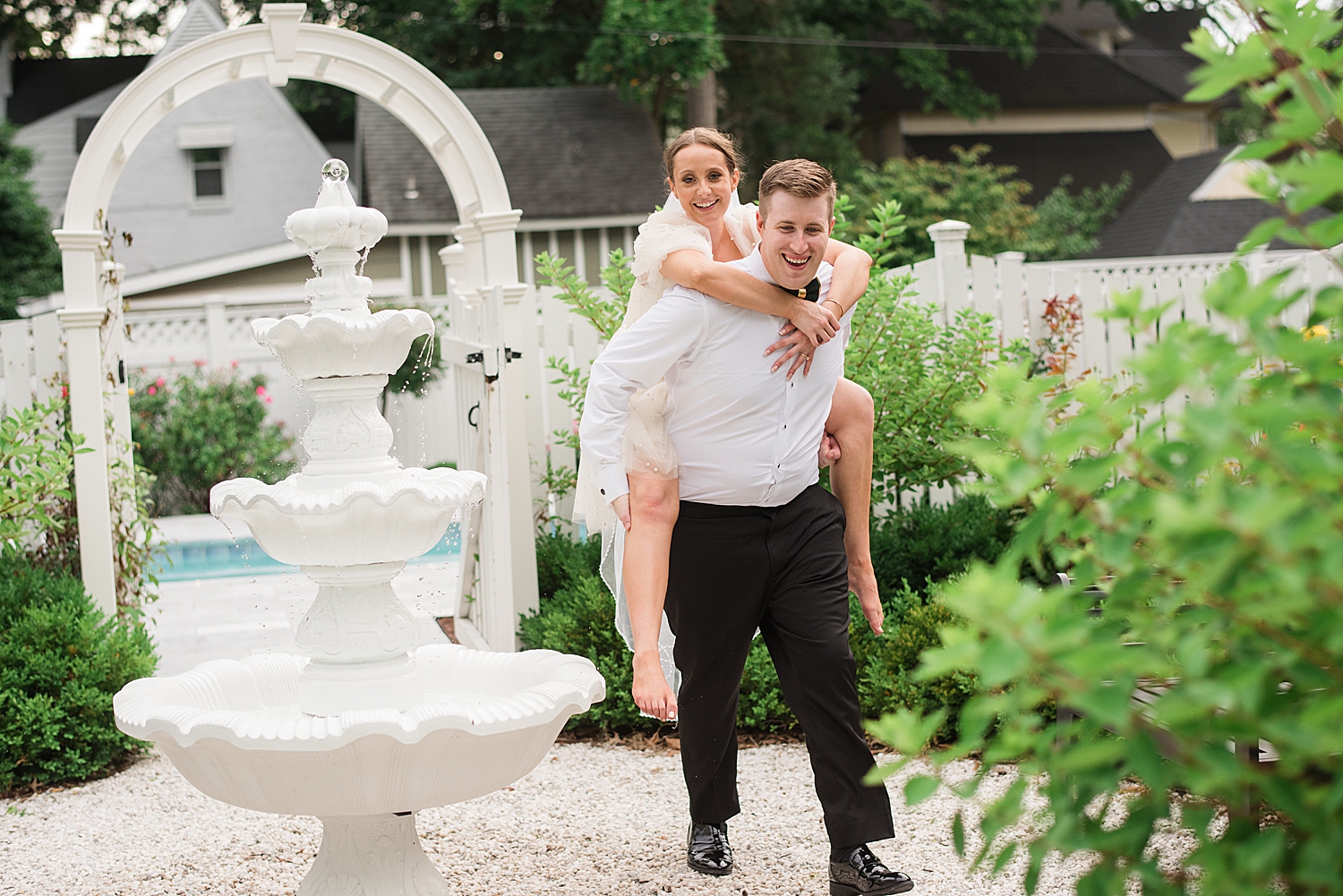 bride piggybacks on groom