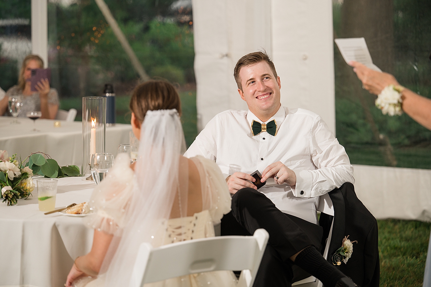 groom reacts to wedding toasts