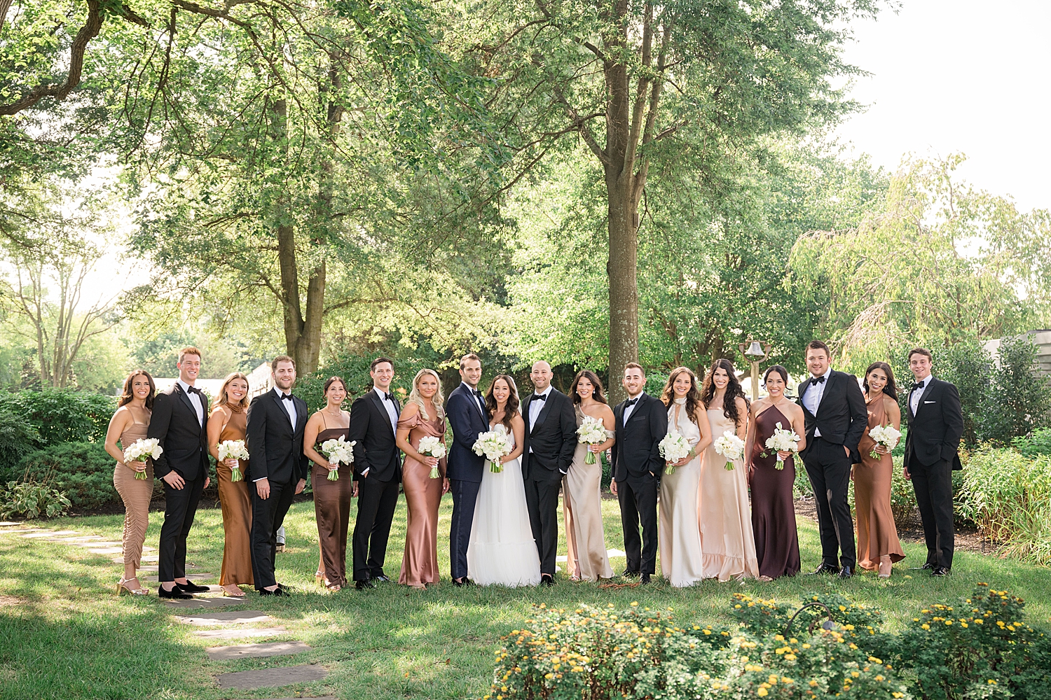 full wedding party smiling