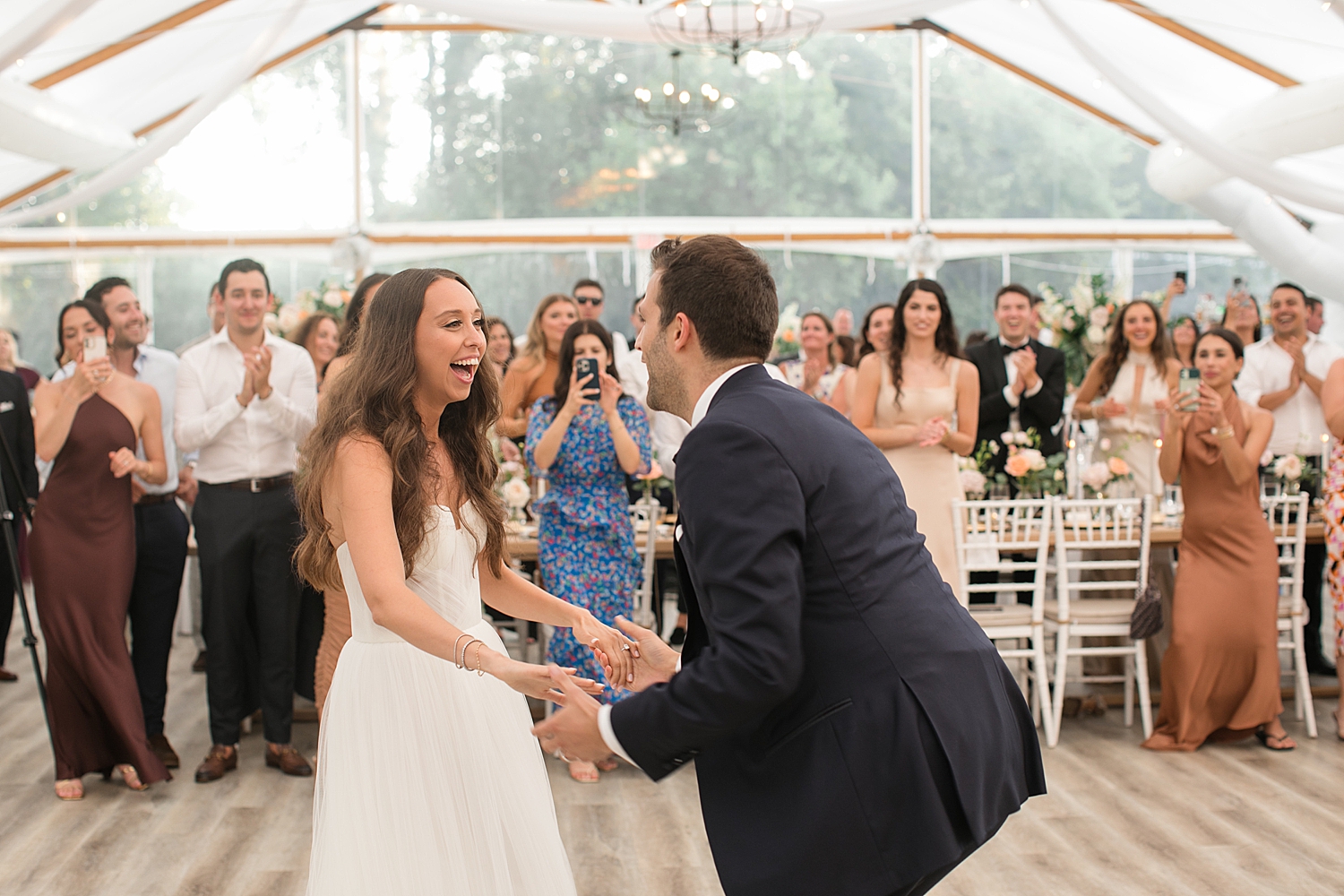 bride and groom enter reception