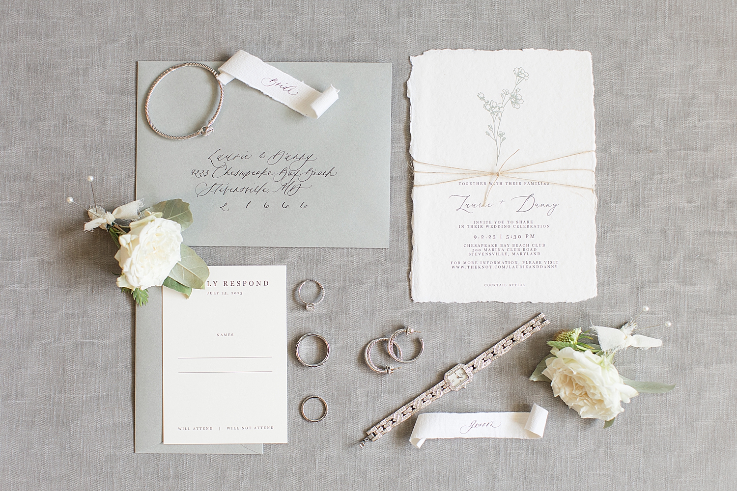 wedding details flat lay, invitation, jewelry, neutral tones