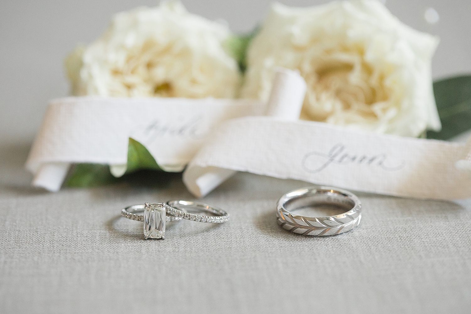 wedding rings and florals close up