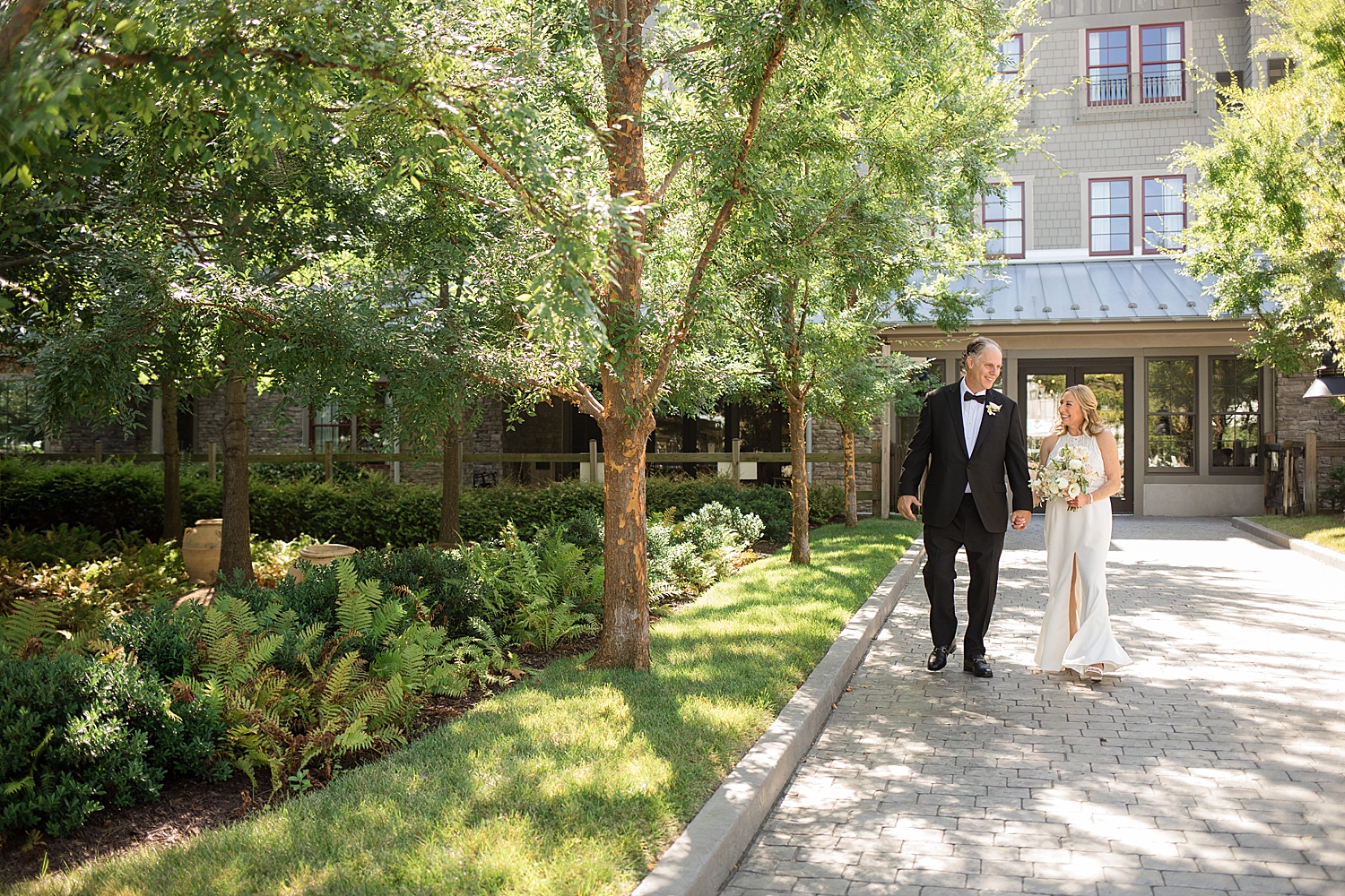 couple portrait, mid 60s couple, white florals, greenery at chesapeake bay beach club inn