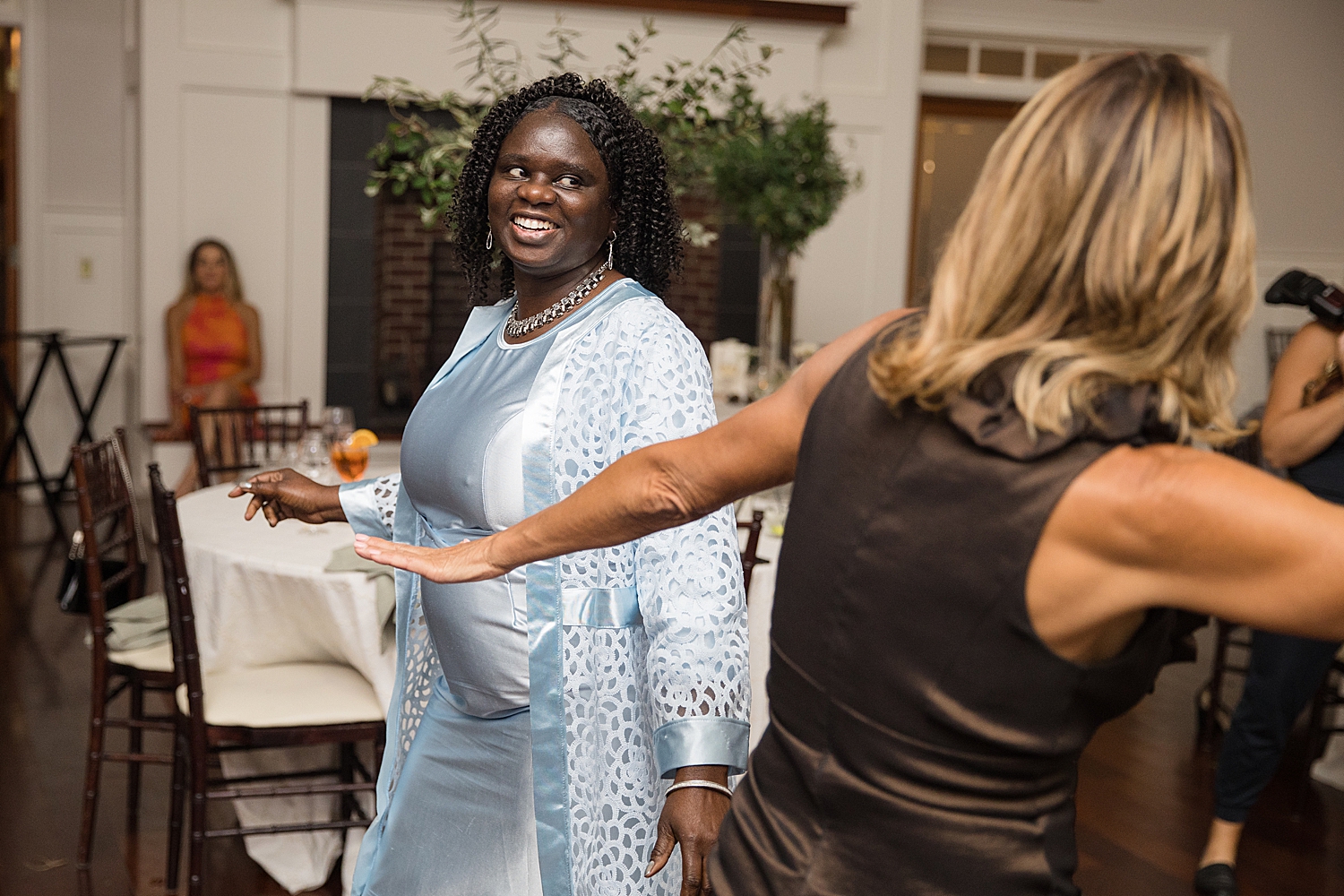 candid wedding guests dancing