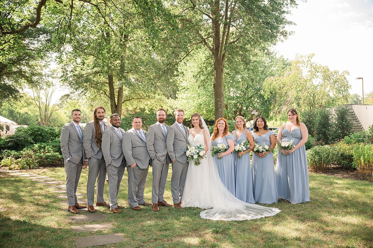 bride and groom with full wedding party