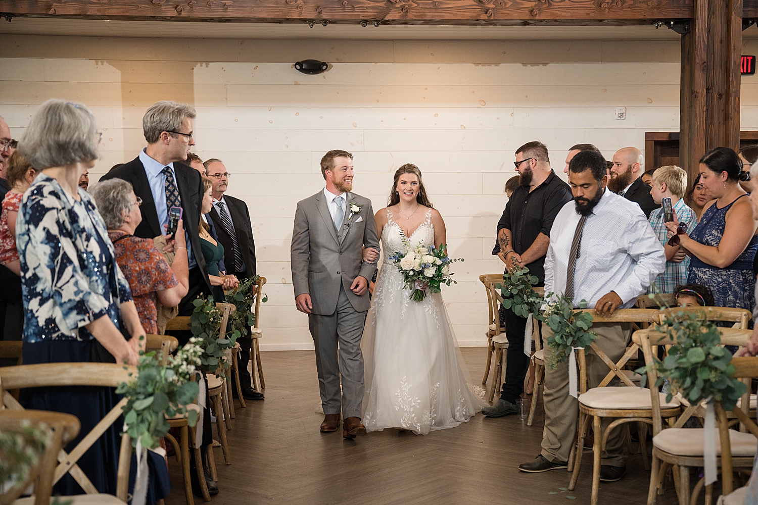 bride and groom entering ceremony together