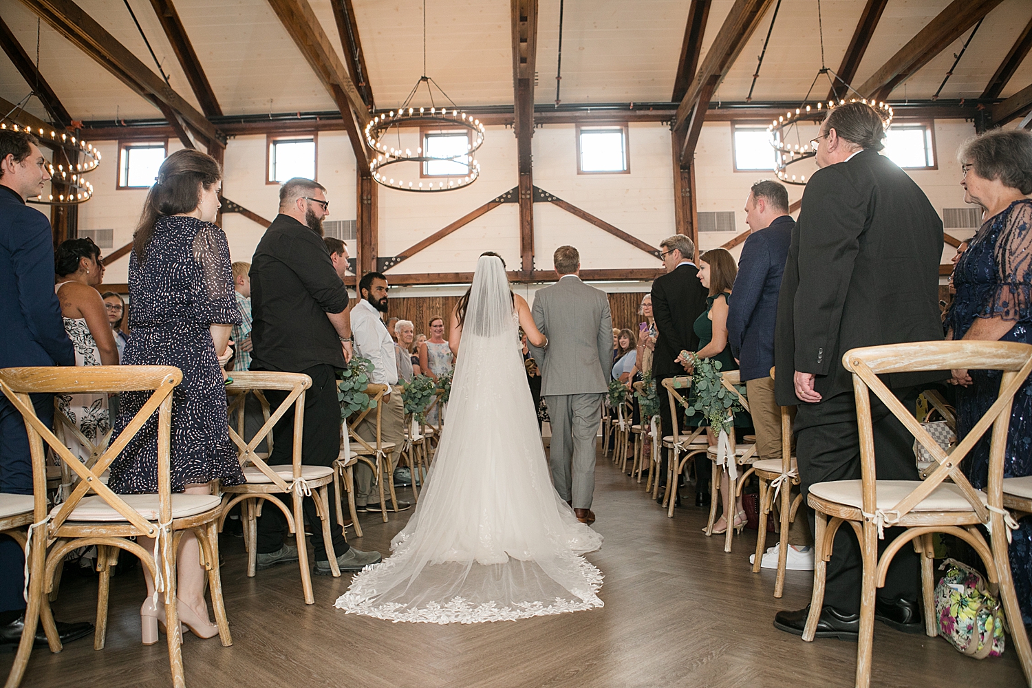 bride and groom entering ceremony together