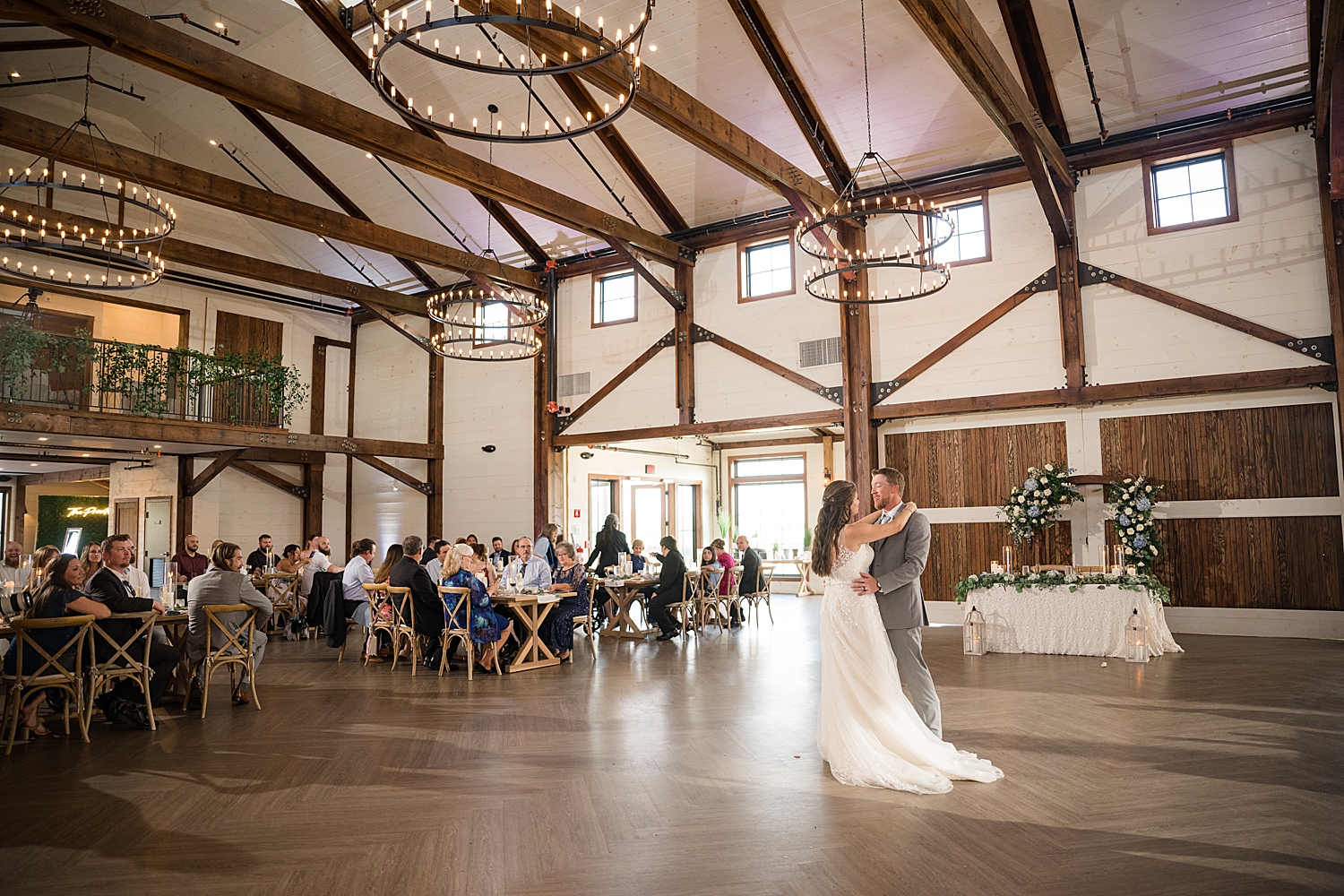 bride and groom first dance farmstead wide shot