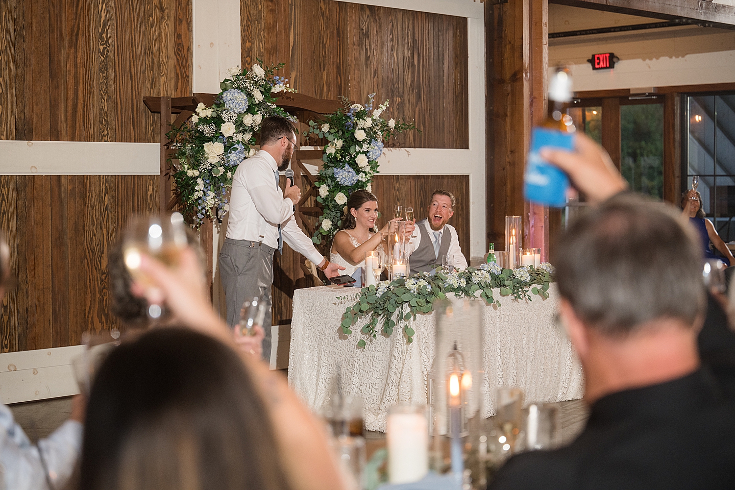 wedding speech, guests raise glasses