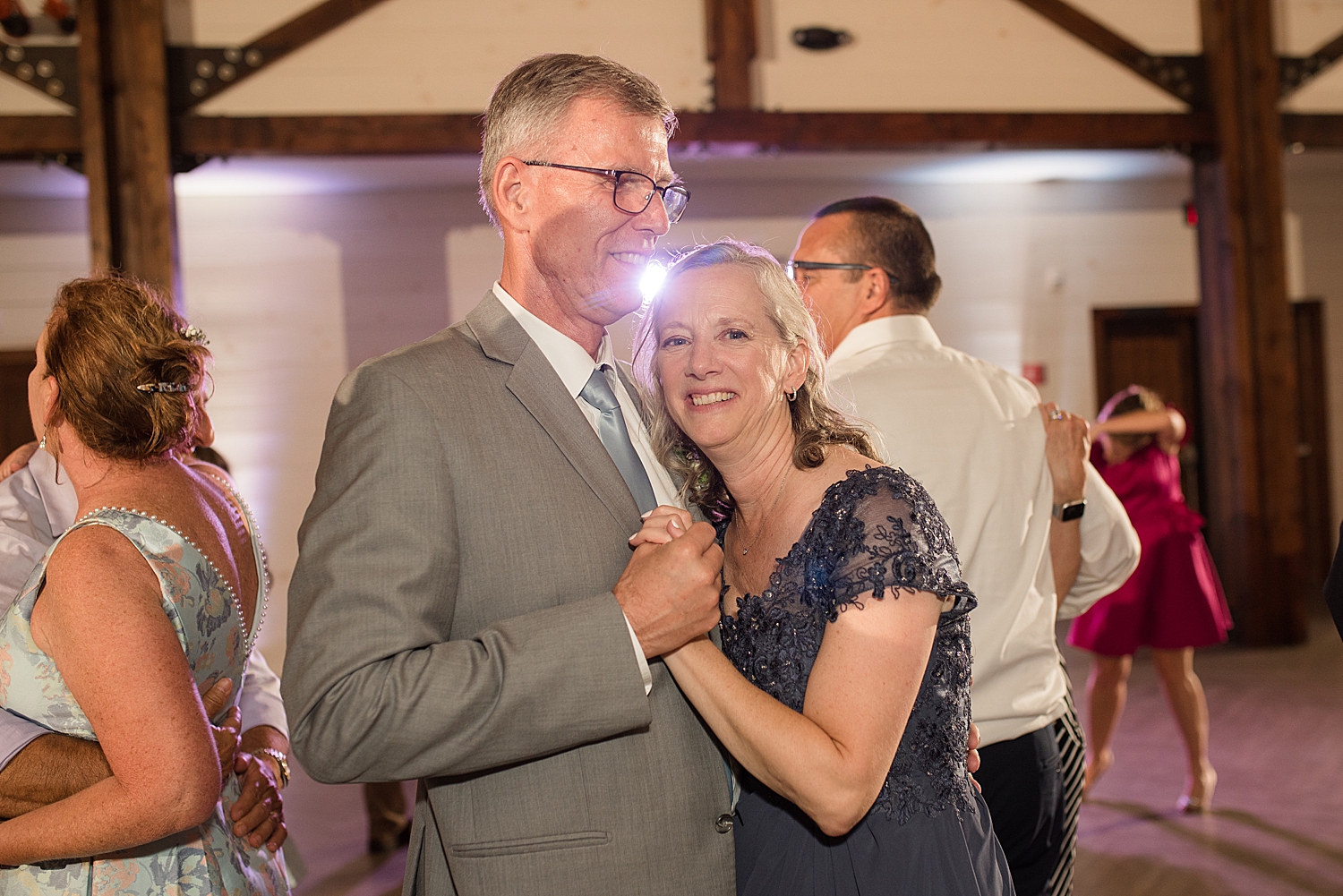 candid wedding guests dancing