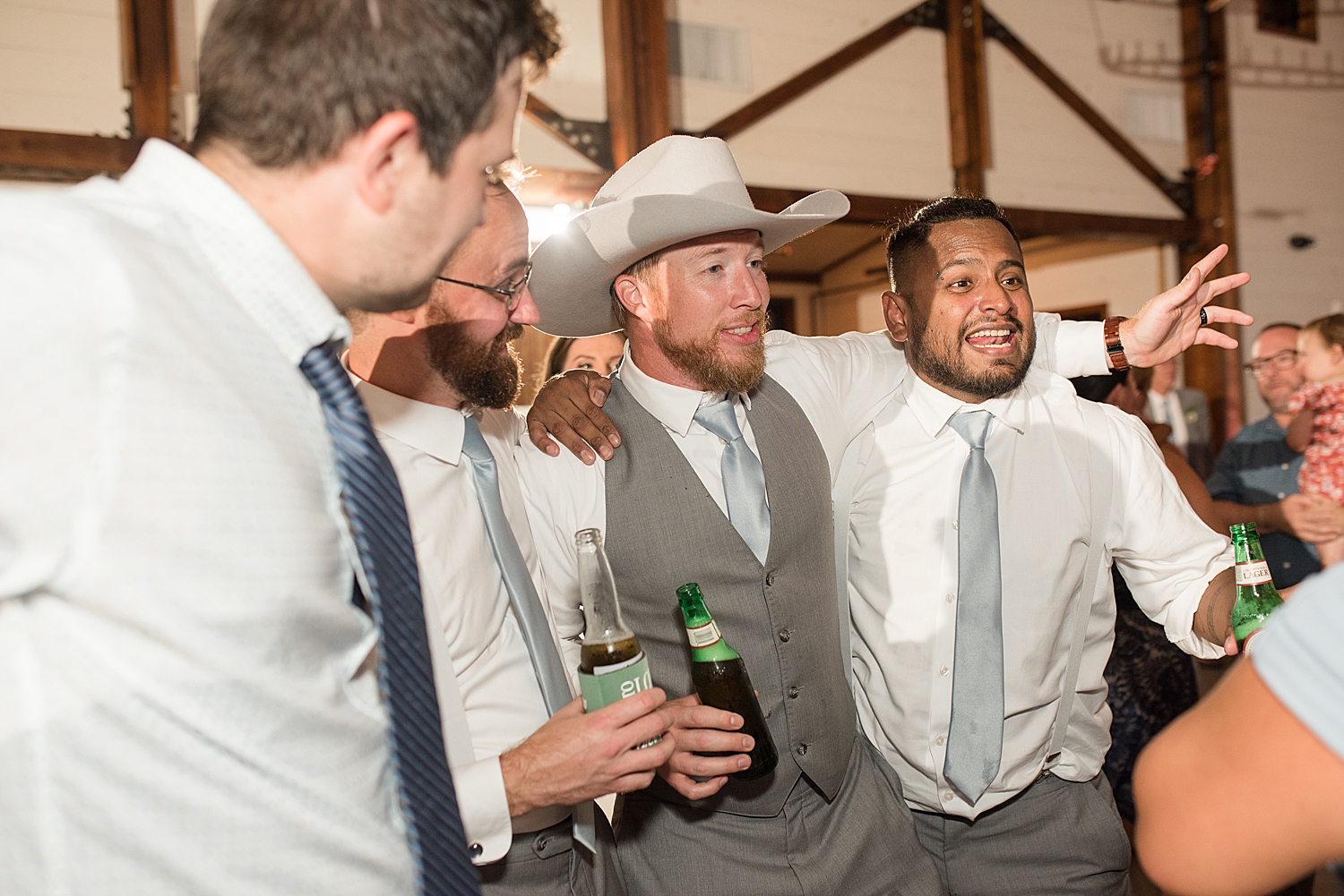 candid wedding guests dancing