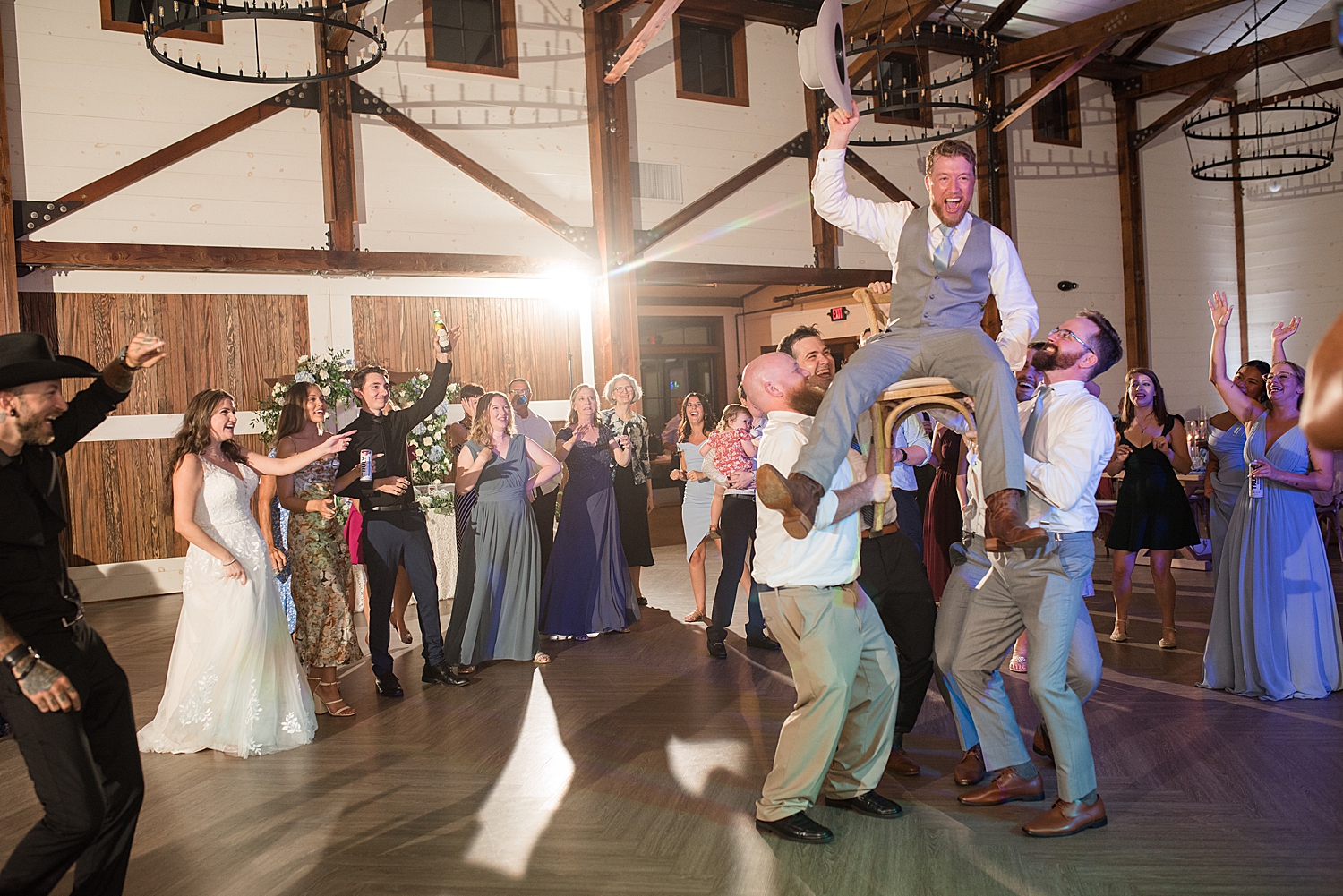 candid wedding guests dancing