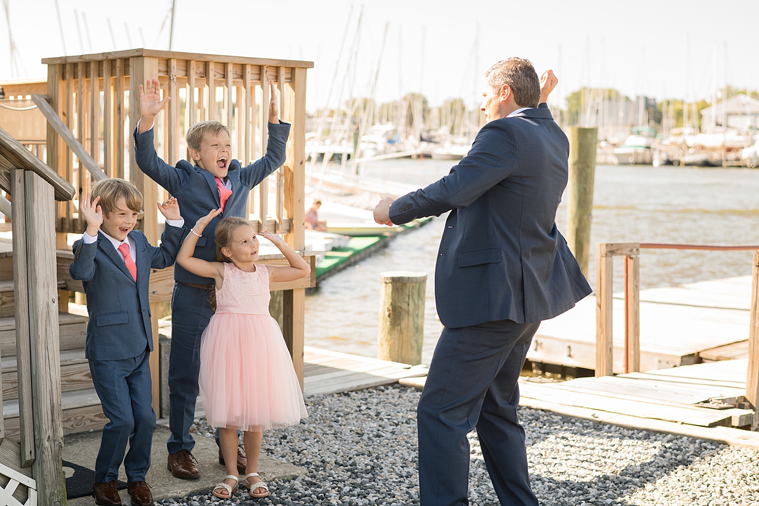 groom and his kids cheering excitedly