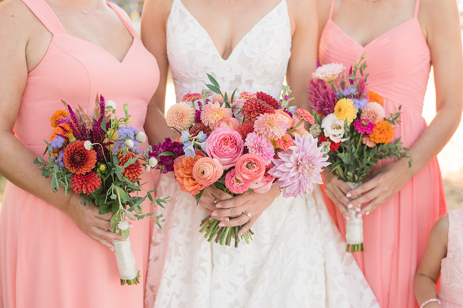 bride and bridesmaids vibrant pink bouquets