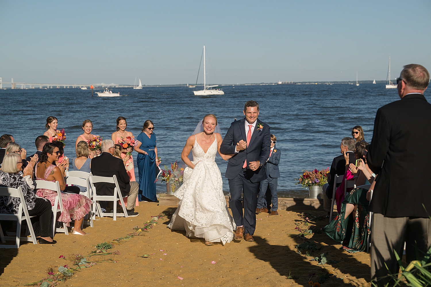 bride and groom happily recess