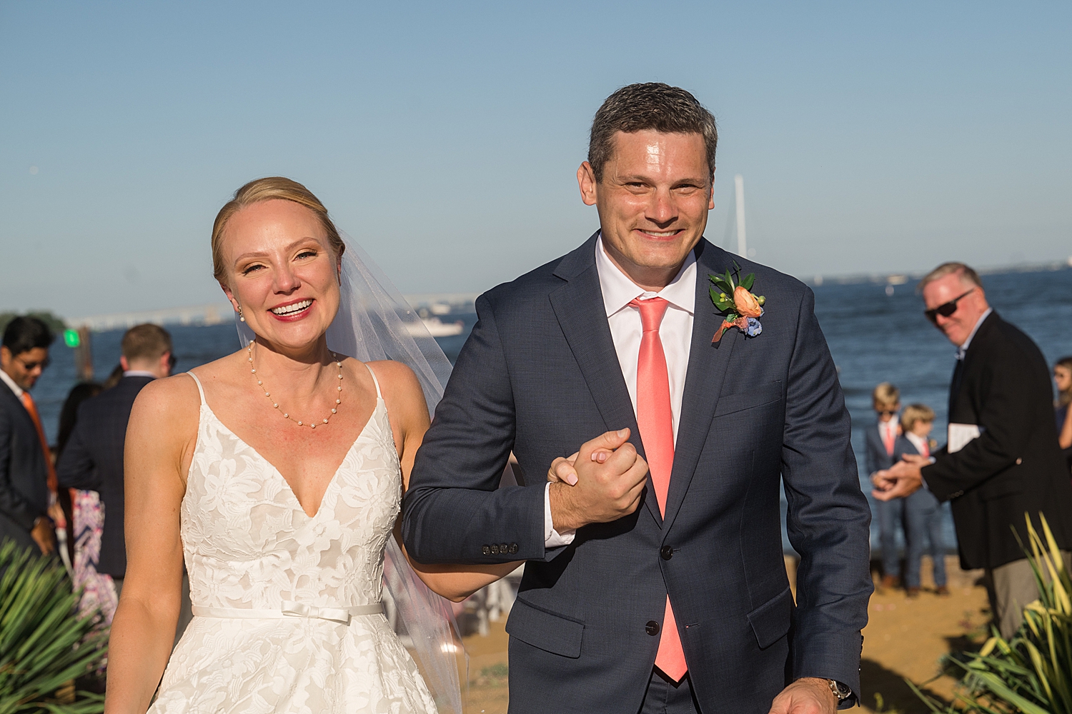 bride and groom happily recess