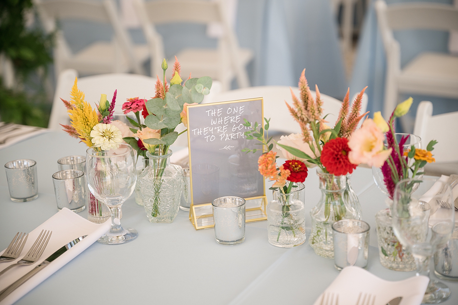 tablescape details with colorful florals and nautical details