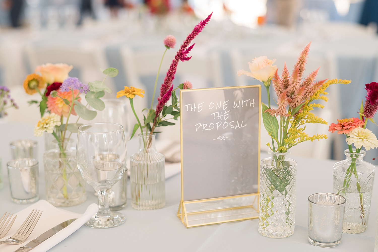 tablescape details with colorful florals and nautical details