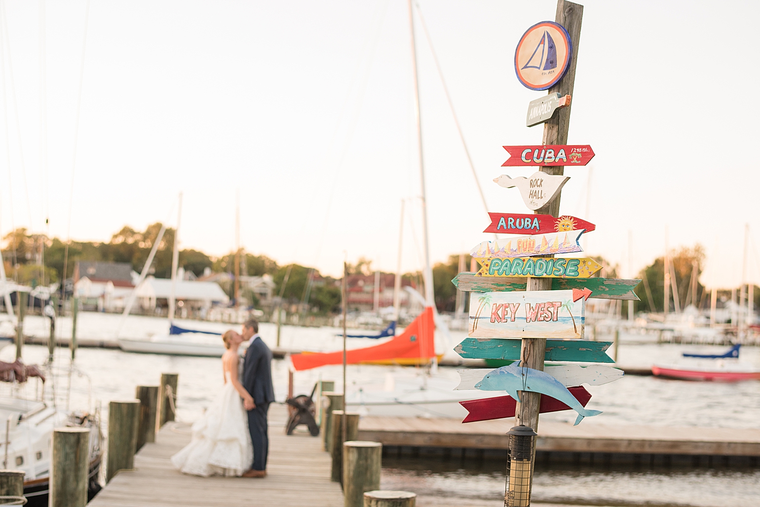 wide shot couple's portrait on docks