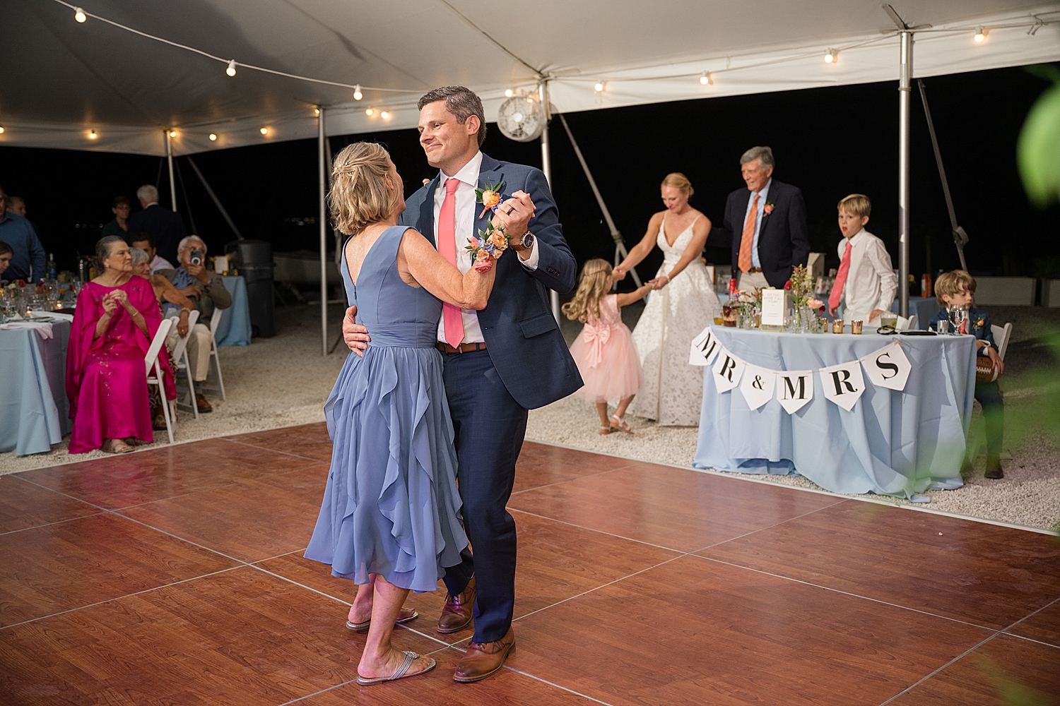 groom dances with his mother