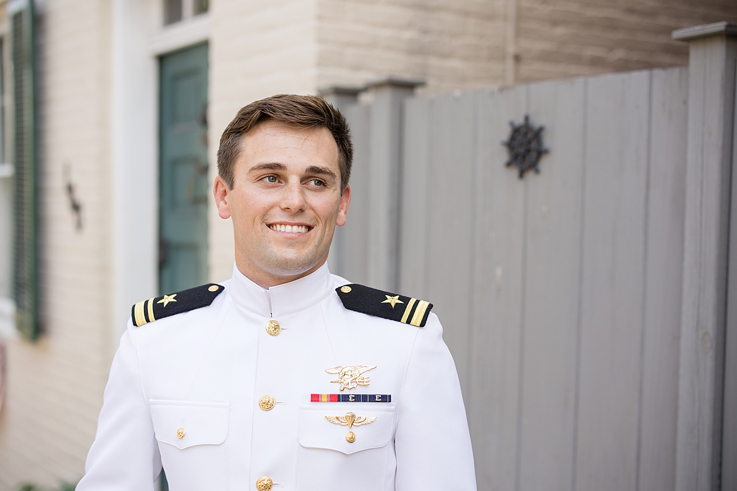 groom portrait in navy whites