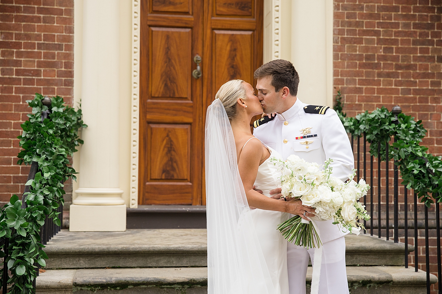 couple kisses at usna