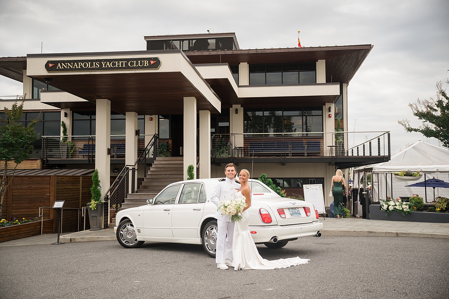 bride and groom at venue with limo