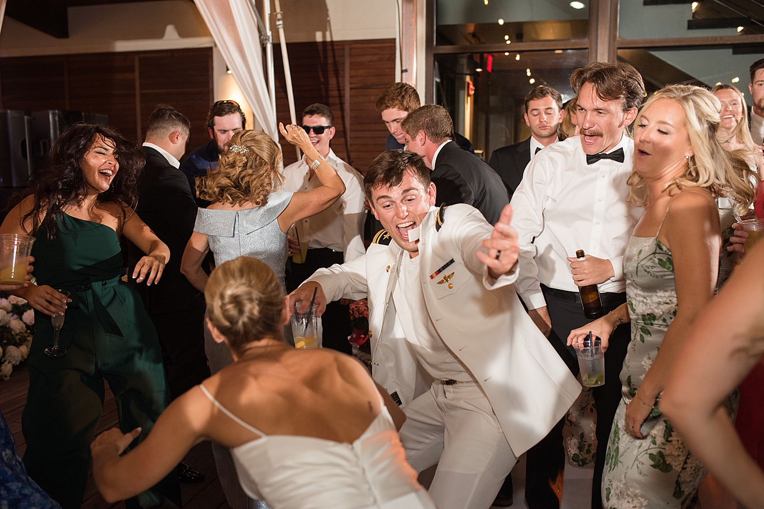 candid wedding guests dancing