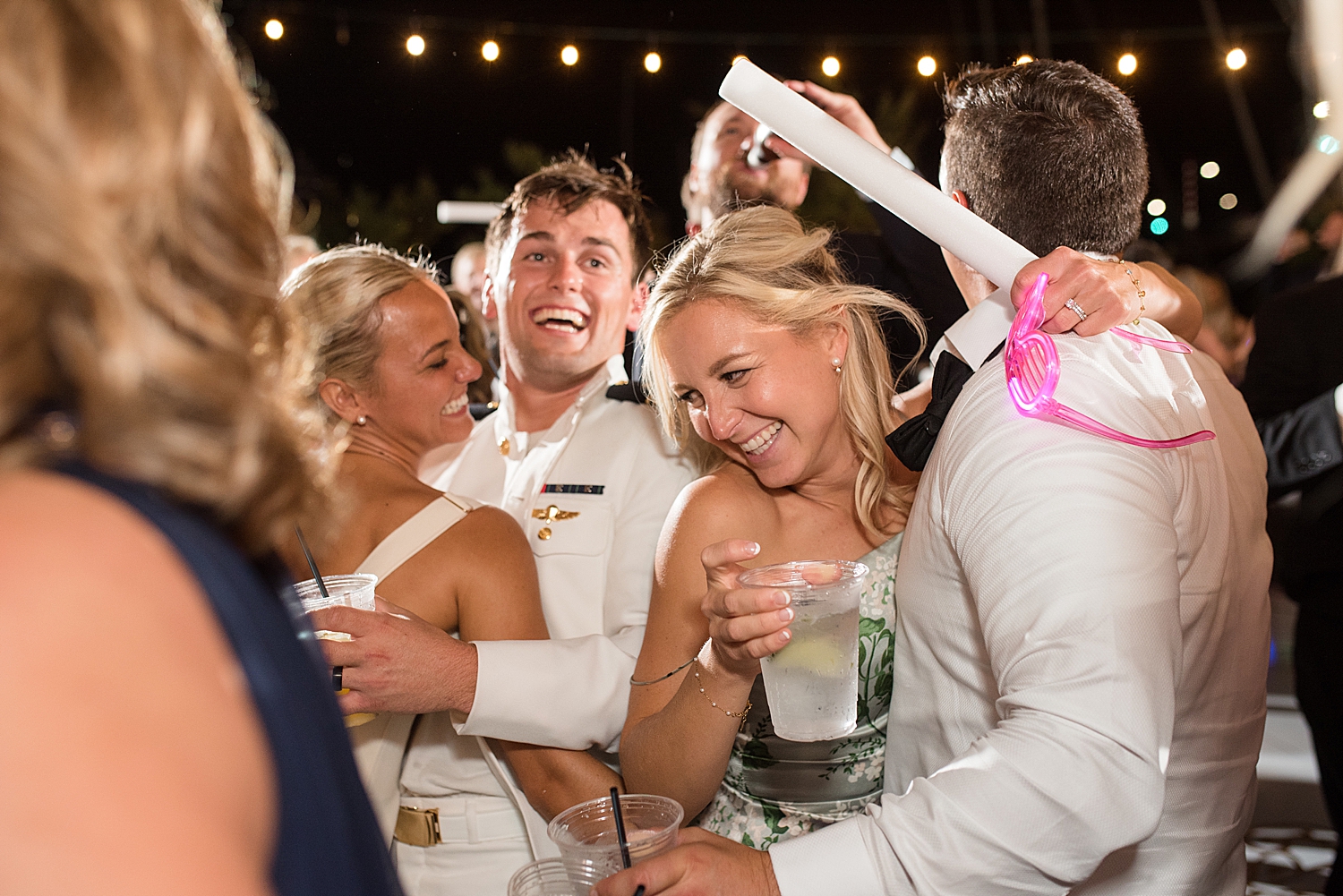 candid wedding guests dancing