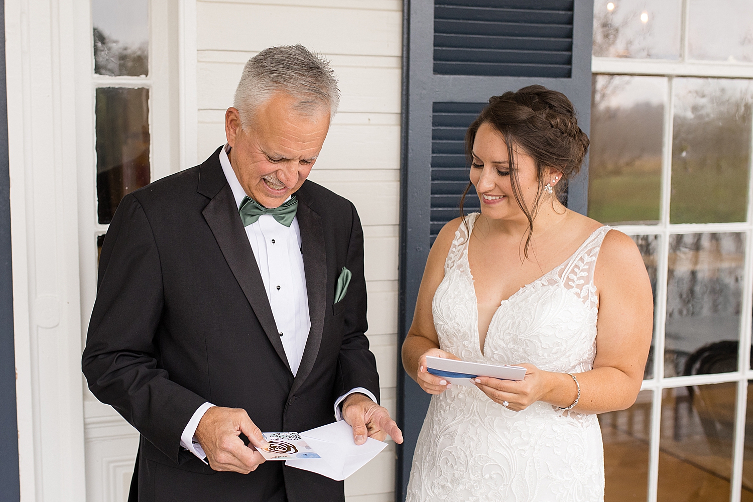 bride watches dad open gift