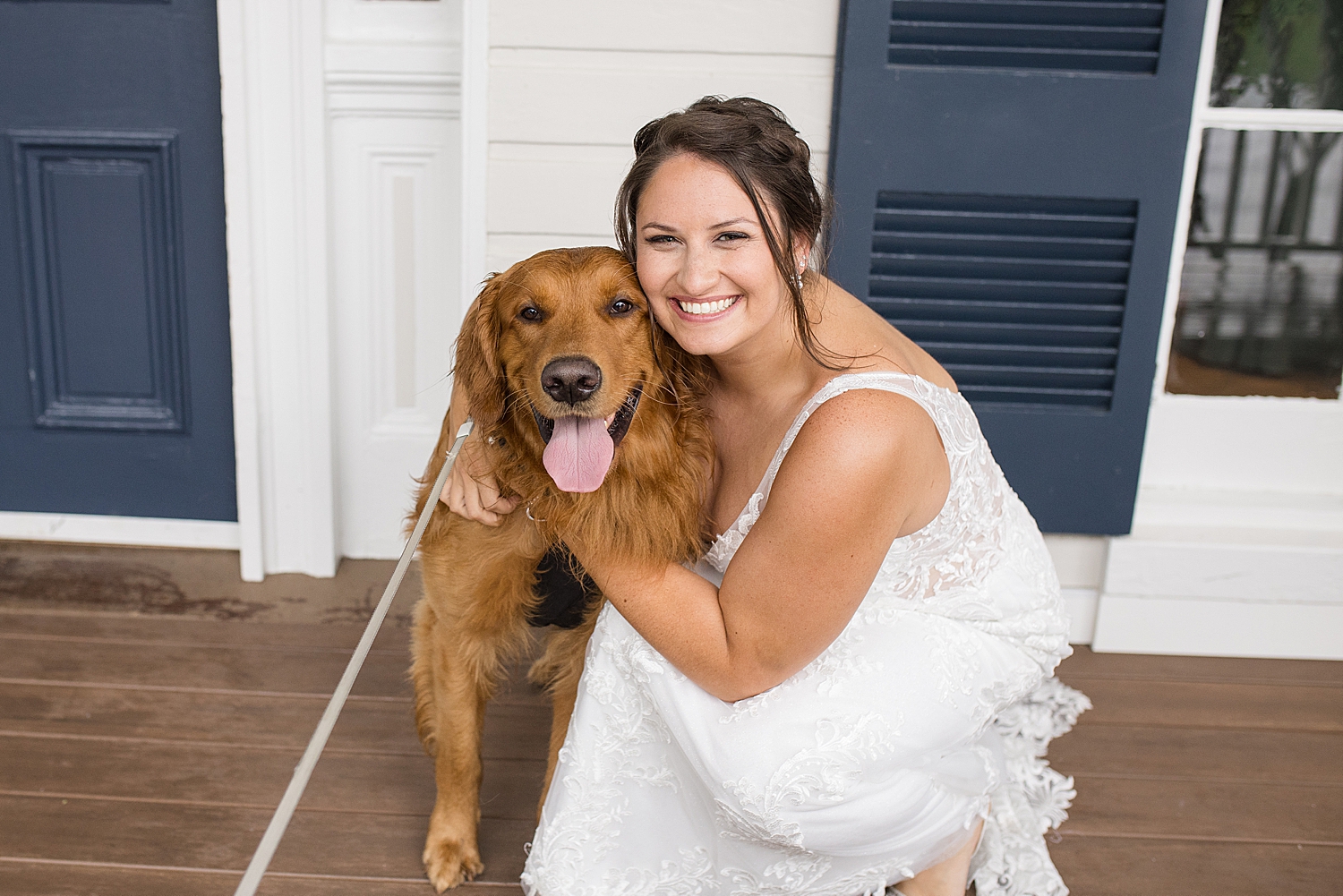 bride smiles with their dog, Bo