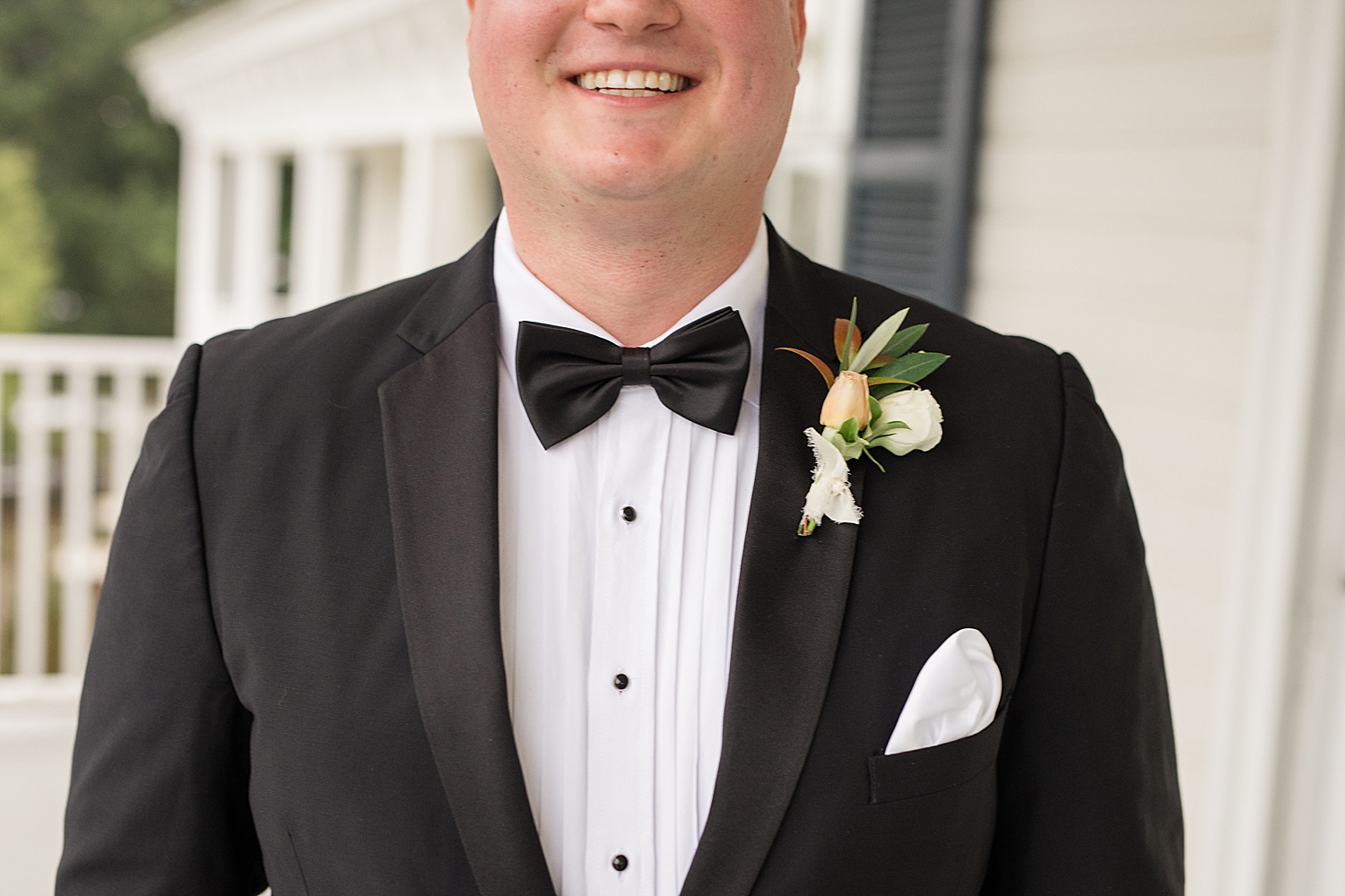 groom portrait, boutonniere detail