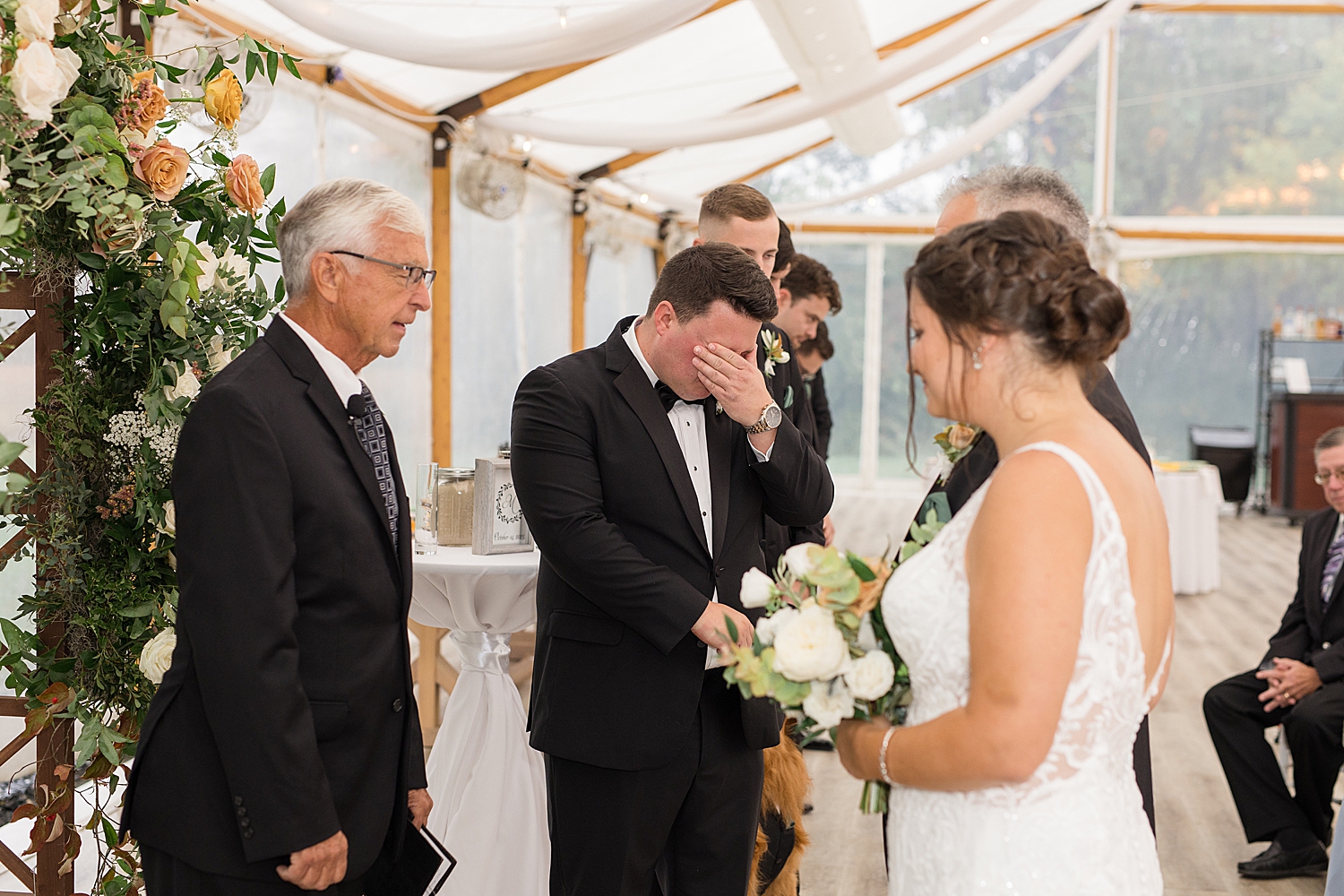 groom cries seeing bride coming down the aisle