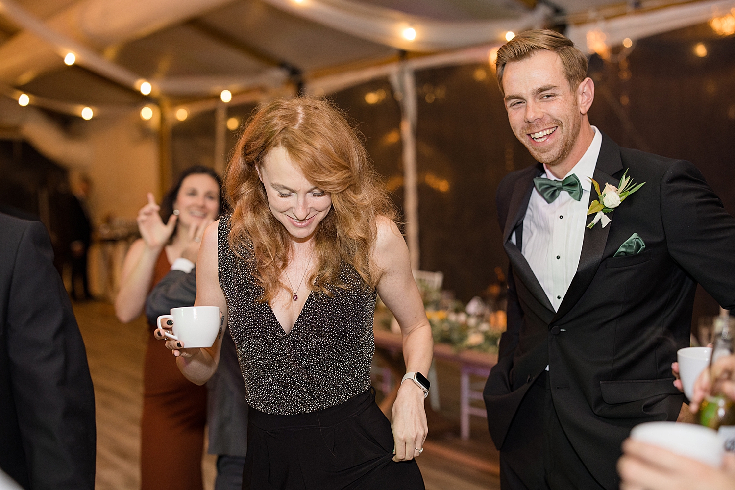 candid wedding guests dancing