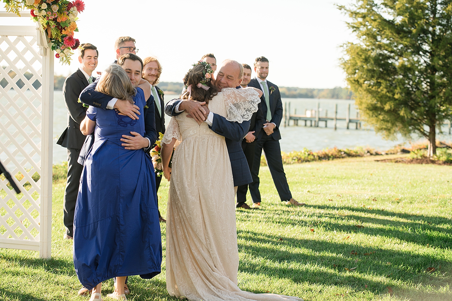 bride hugging parents