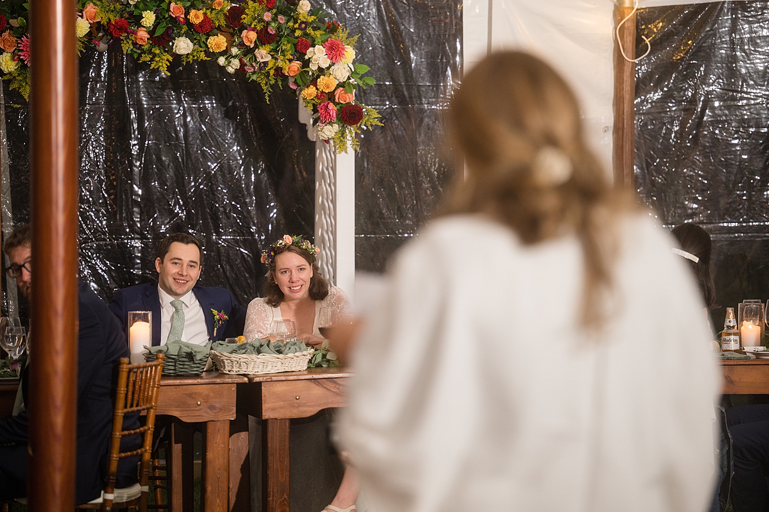 bride and groom react to toasts