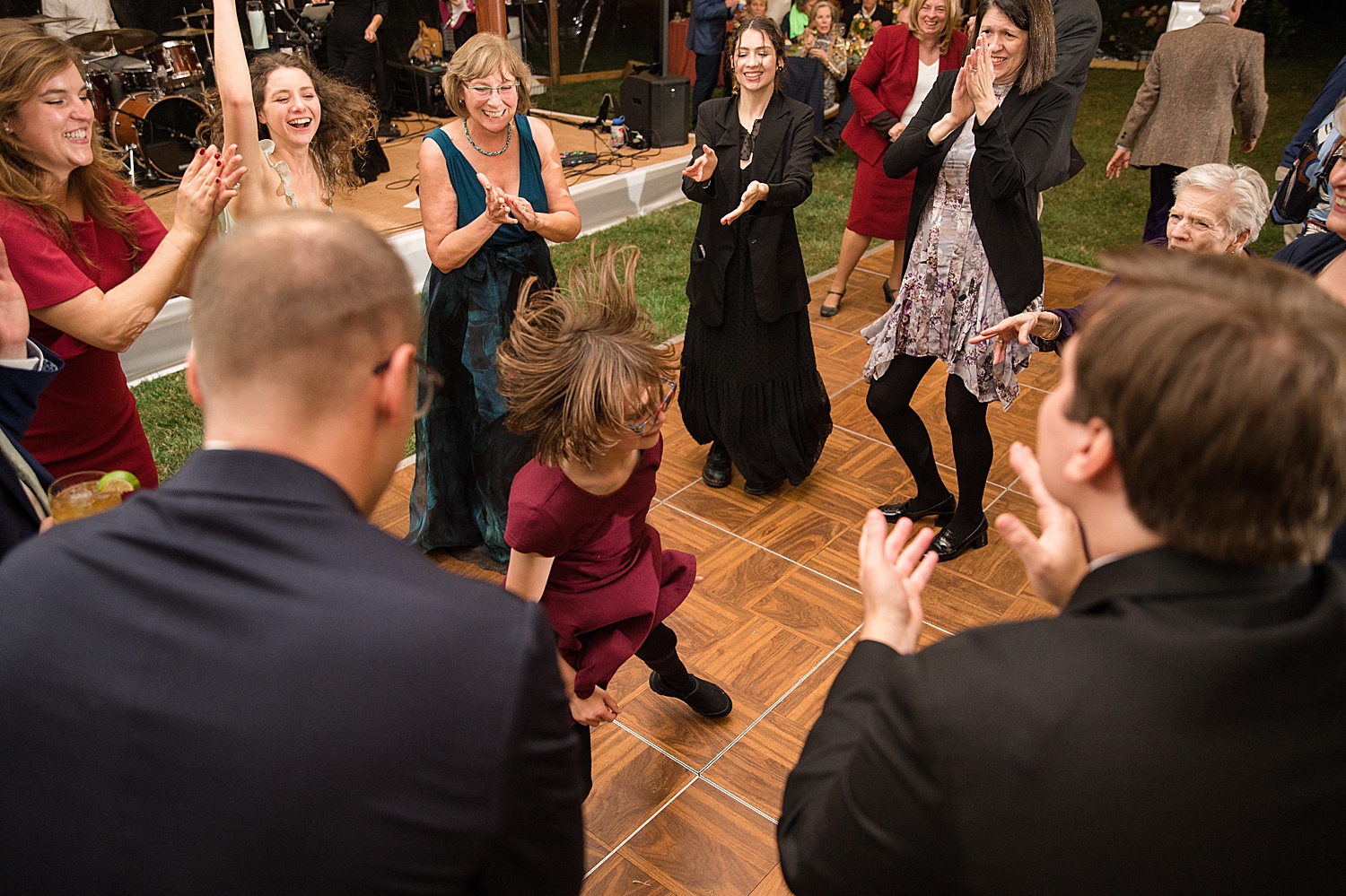 candid wedding guests dancing