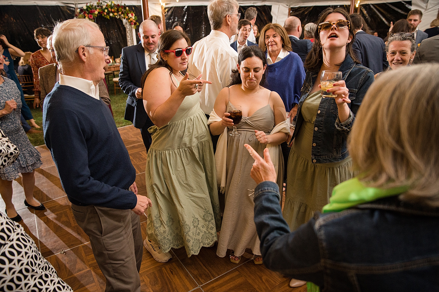 candid wedding guests dancing