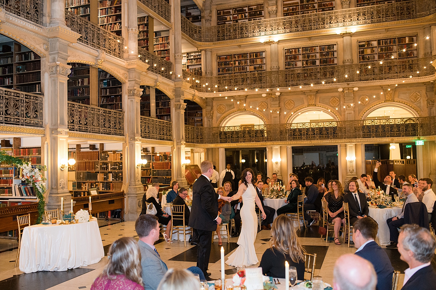 bride and groom enter reception