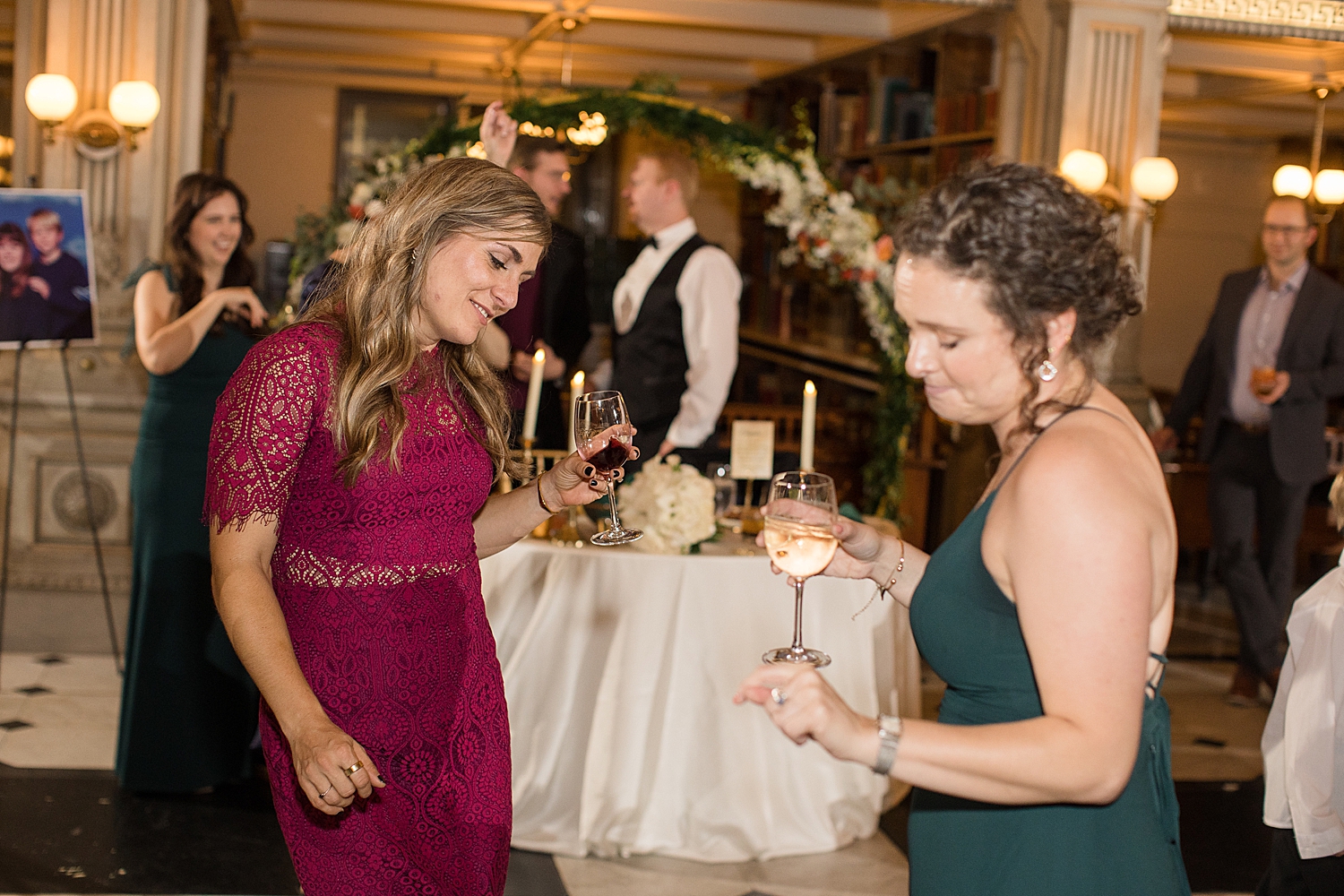 candid wedding guests dancing