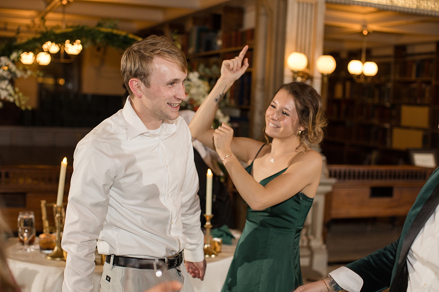 candid wedding guests dancing