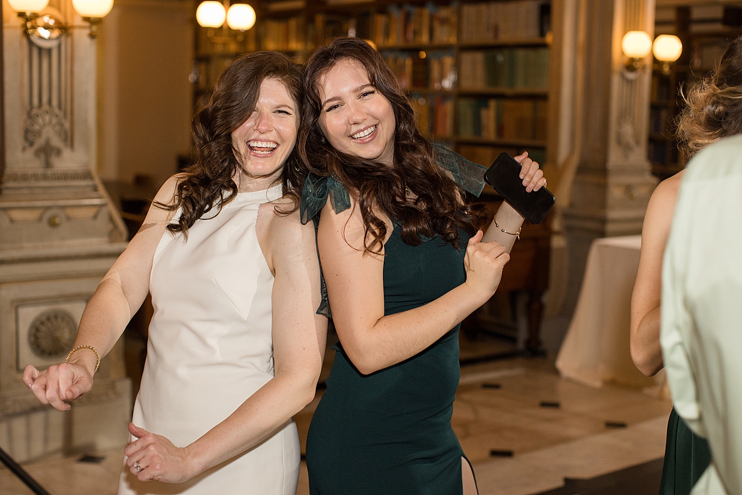 candid wedding guests dancing