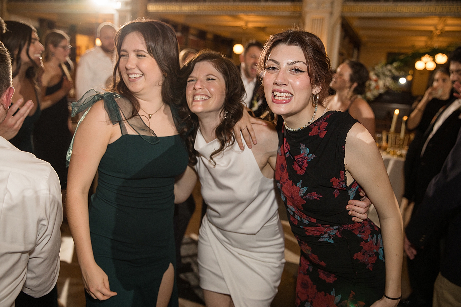 candid wedding guests dancing