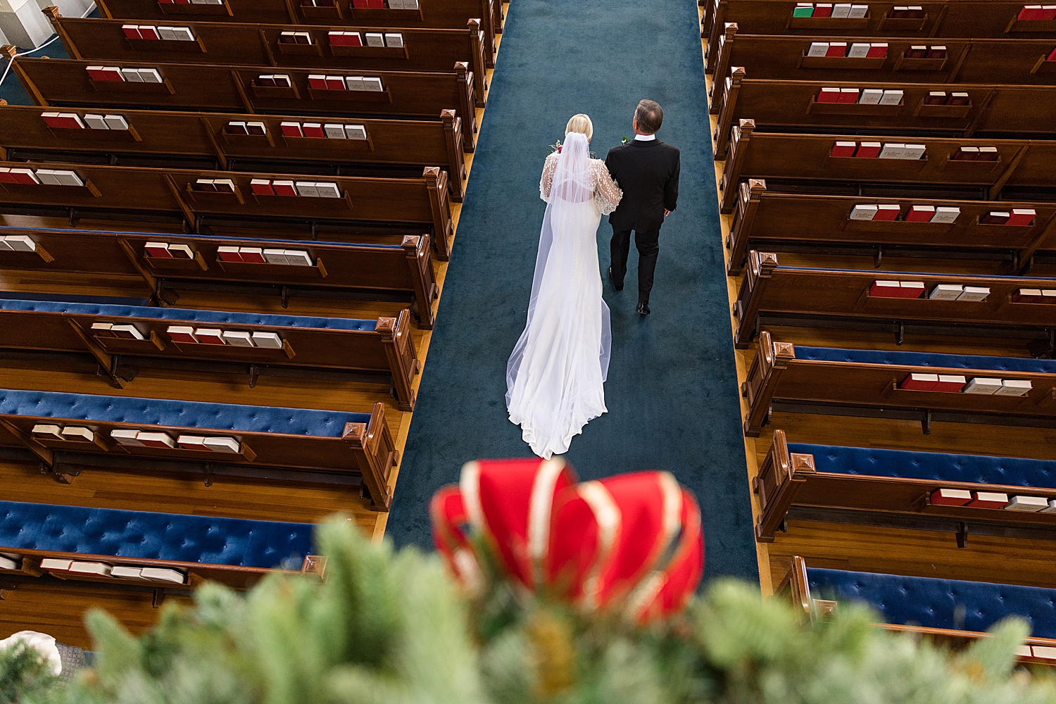 bride and her dad walking down the aisle