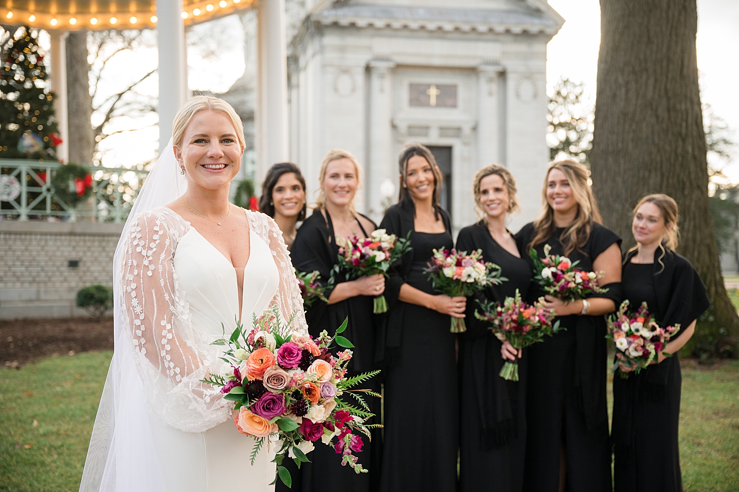 bride with bridesmaids in background