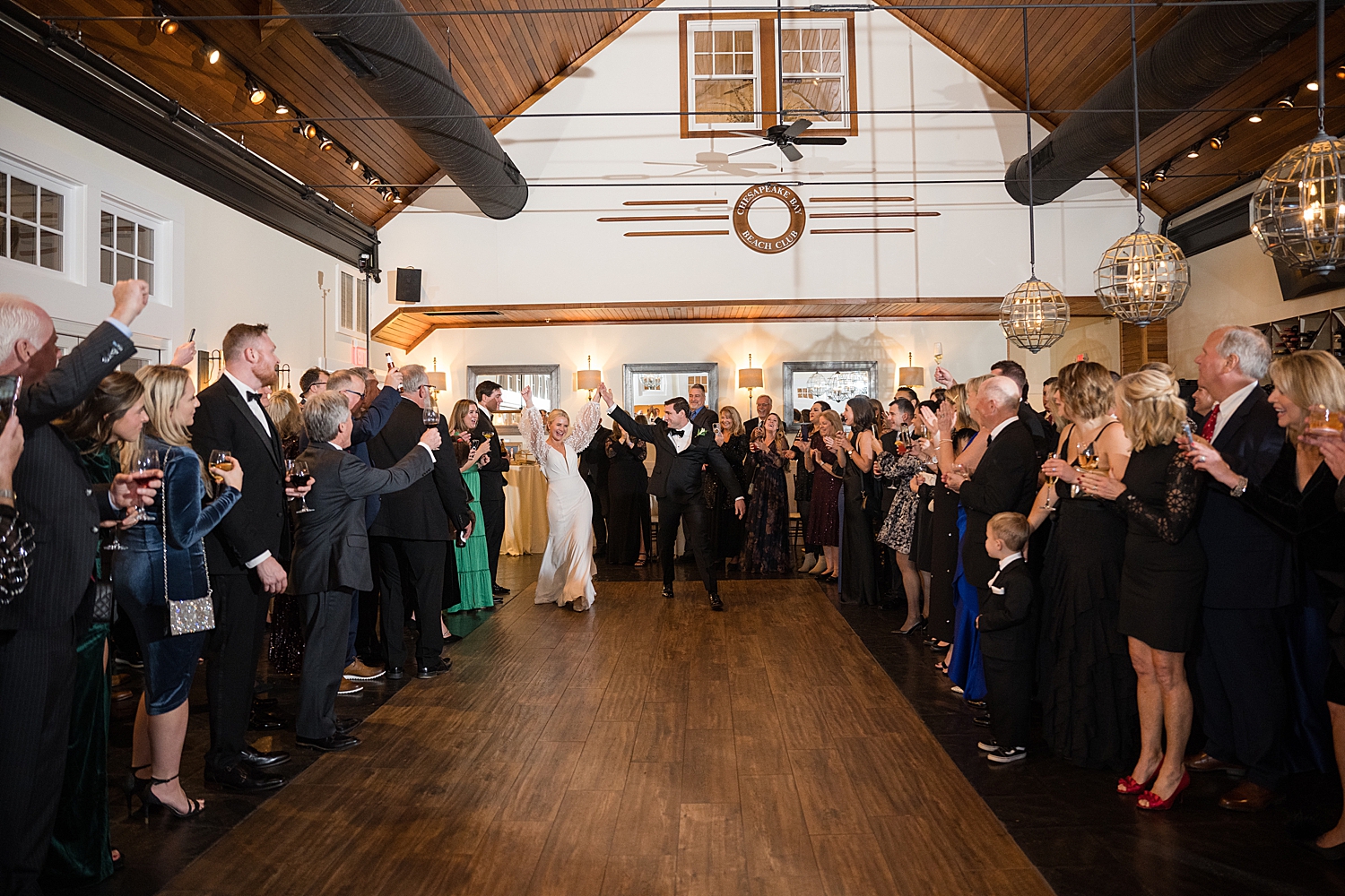 bride and groom enter to dance at chesapeake bay beach club